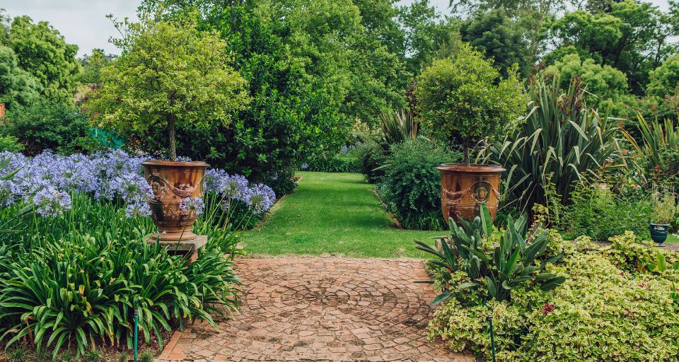 A lush, manicured garden maintained by Green Cube